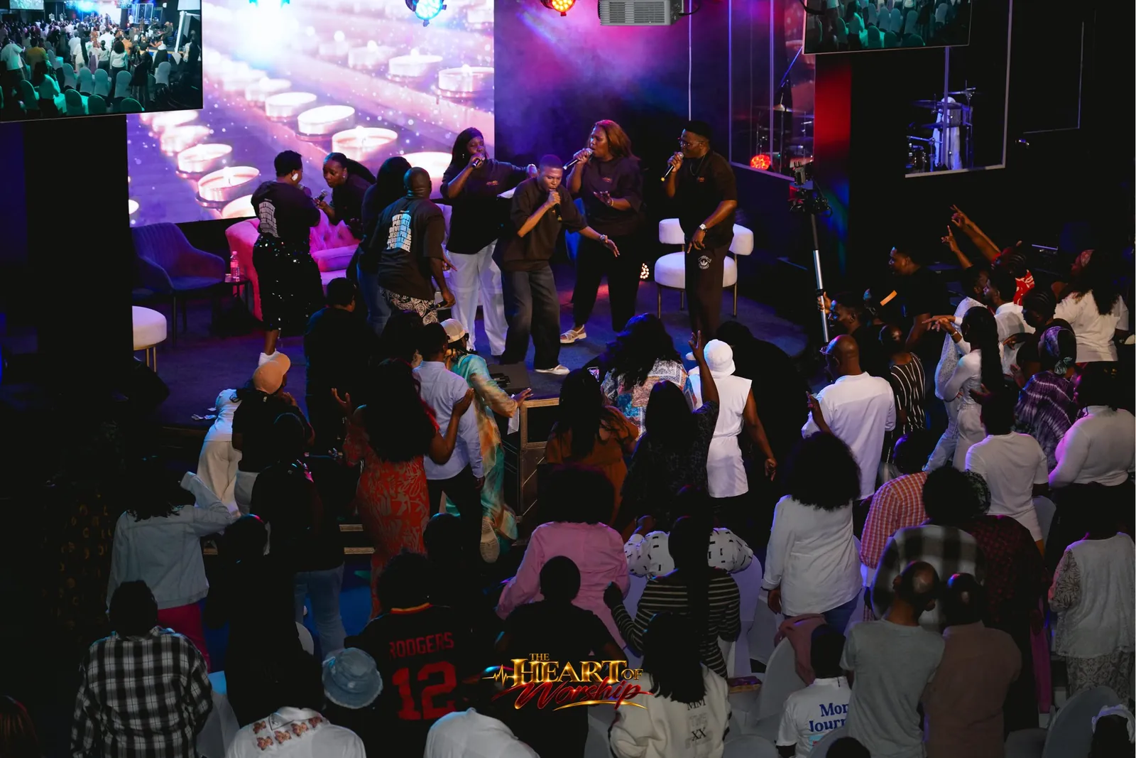 Worshippers lifting their hands during The Heart of Worship night